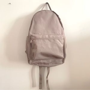 Girlfriend collective please recycle backpack purple